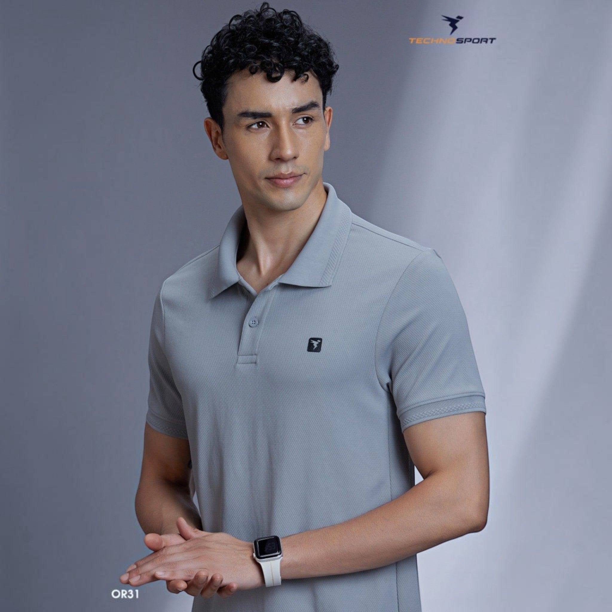City Center OR31 men's premium grey polo shirt with a structured collar and textured fabric worn by a male model.