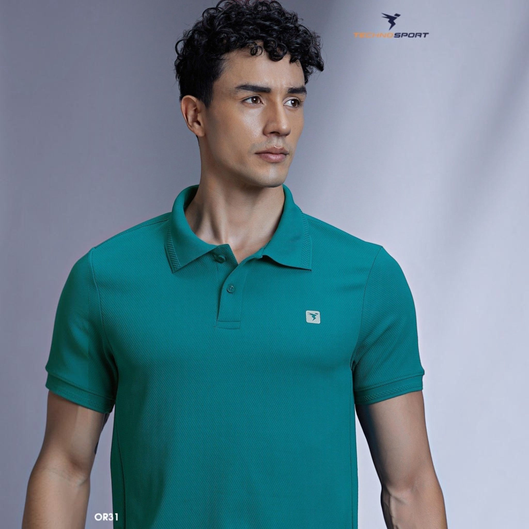 City Center OR31 men's premium teal polo shirt with a structured collar and short sleeves worn by a male model.