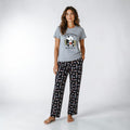 City Center grey t-shirt with panda graphic and patterned lounge pants worn by a woman