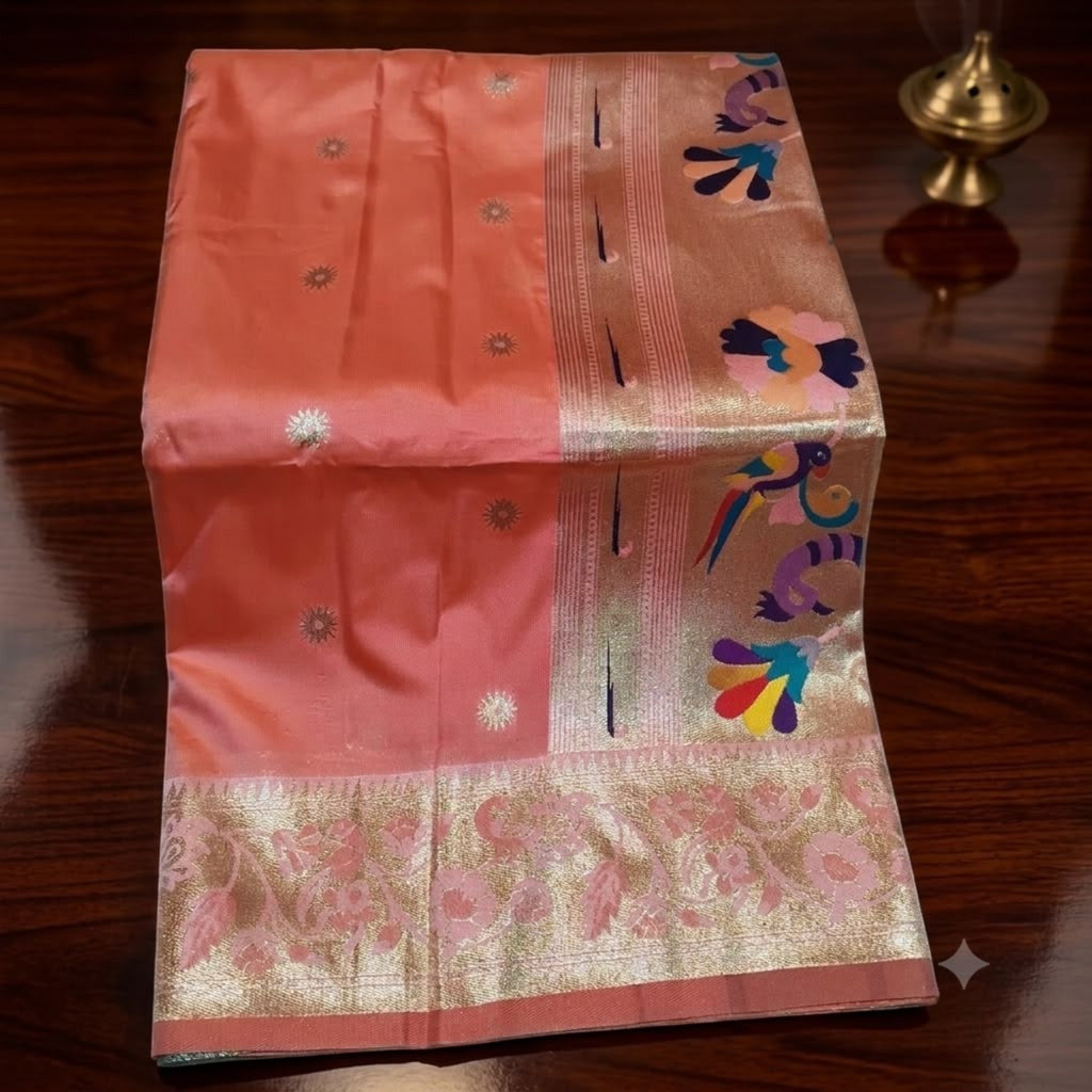 City Center peach pure silk Muniya Paithani saree featuring a gold zari border and vibrant handwoven parrot motifs
