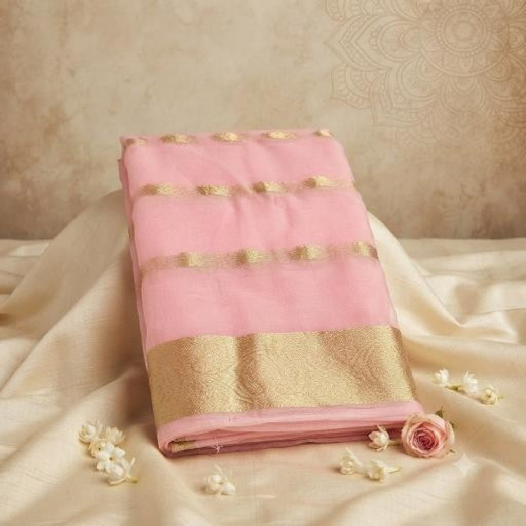 City Center light pink organza saree with gold beet work embroidery and a wide metallic border