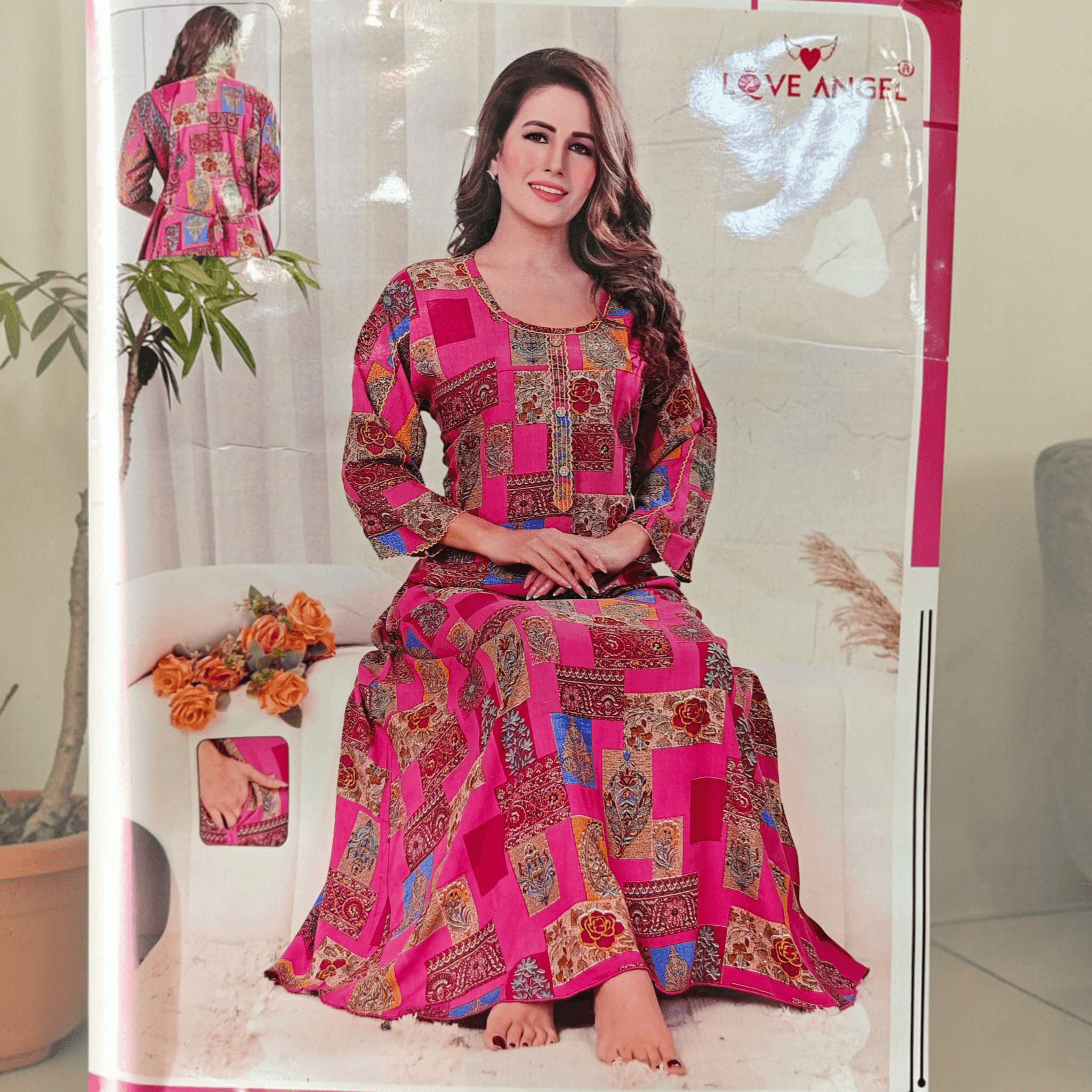 City Center heavy rayon A-line gown in vibrant pink with a multi-colored patchwork print and three-quarter sleeves.