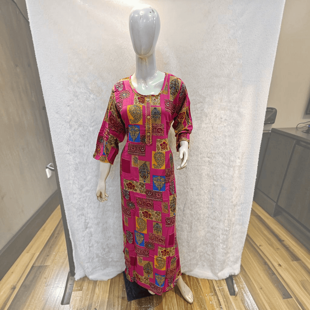 City Center heavy rayon A-line gown in pink with a vibrant multi-colored geometric and paisley print pattern.