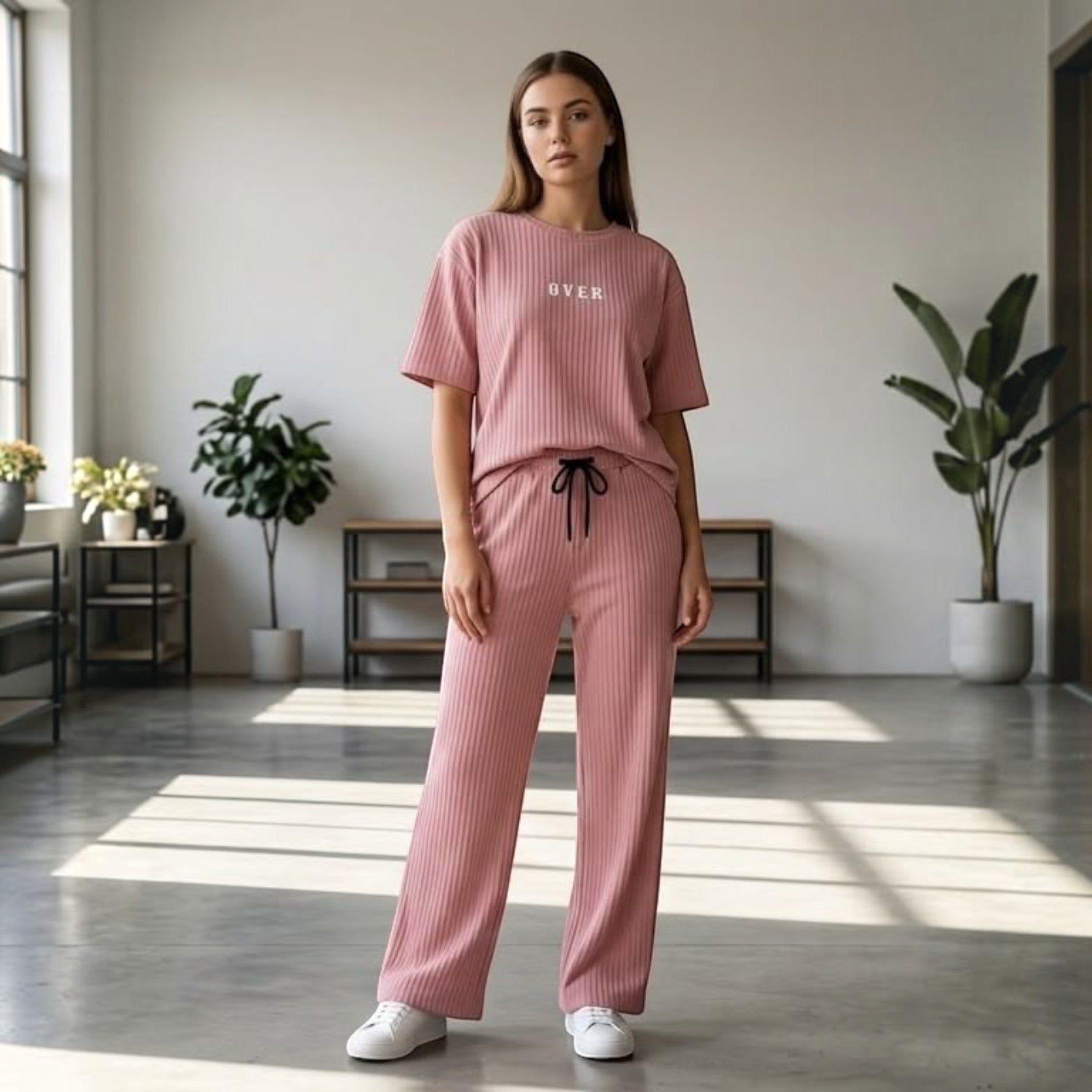 City Center Korean airport cord set in dusty pink with ribbed texture, oversized top, and wide-leg trousers.