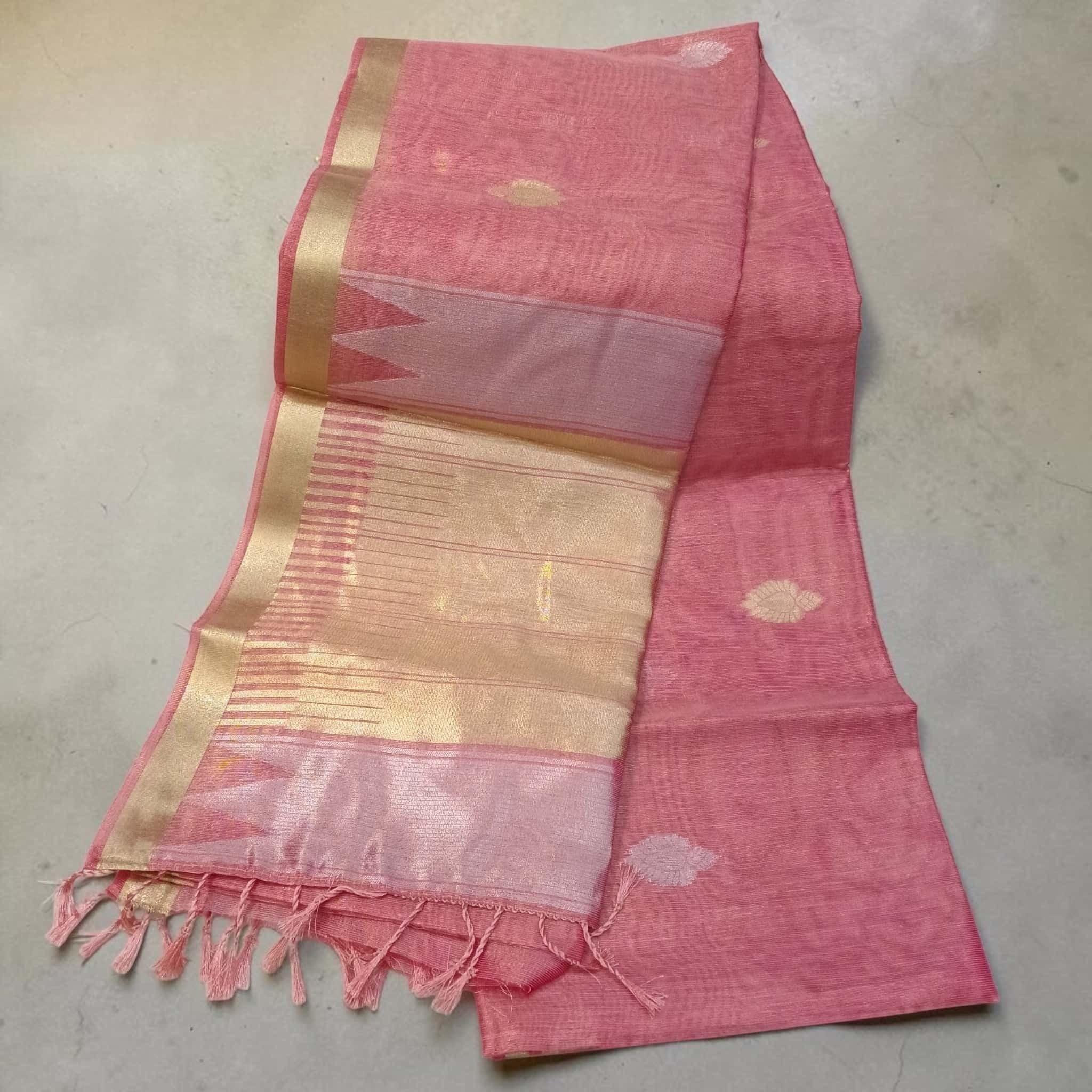 City Center pink tissue cotton saree with gold zari border and delicate woven motifs, lightweight ethnic drape.