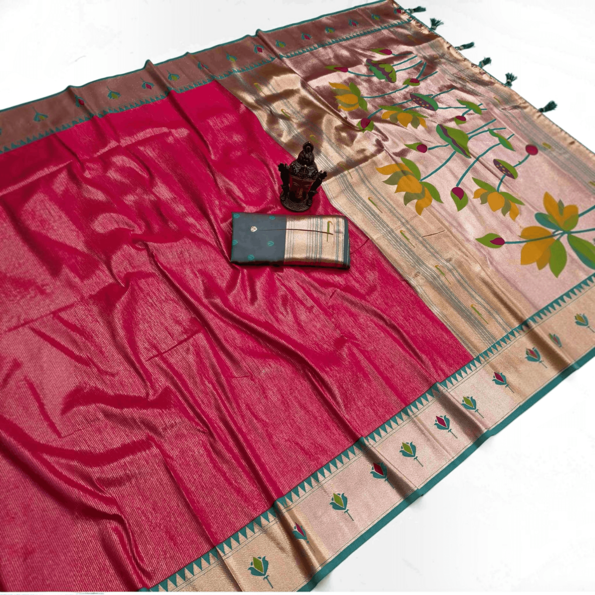 City Center pink tissue Paithani saree with metallic sheen, lotus motifs on the pallu, and matching blouse piece.