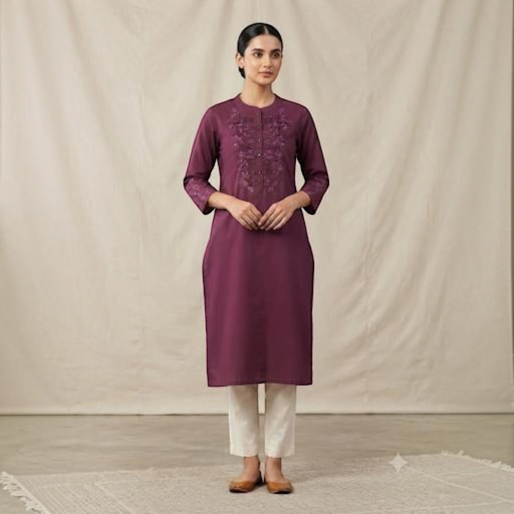 City Center premium plum straight kurti with intricate embroidery, paired with cream trousers for an elegant look.