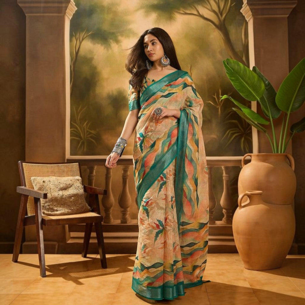 City Center premium cotton saree with abstract wave patterns in peach and teal, worn by a model in a rustic studio.