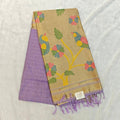 City Center pure silk Jamdani saree featuring a gold pallu with floral bird motifs and a lavender body with zari lines.