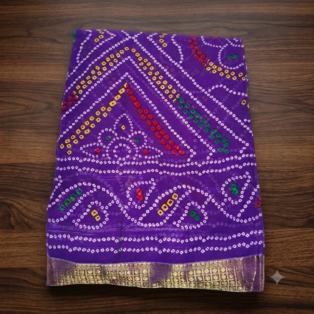 City Center Bandhan silk saree in vibrant purple with traditional multi-colored bandhani tie-dye and gold border.