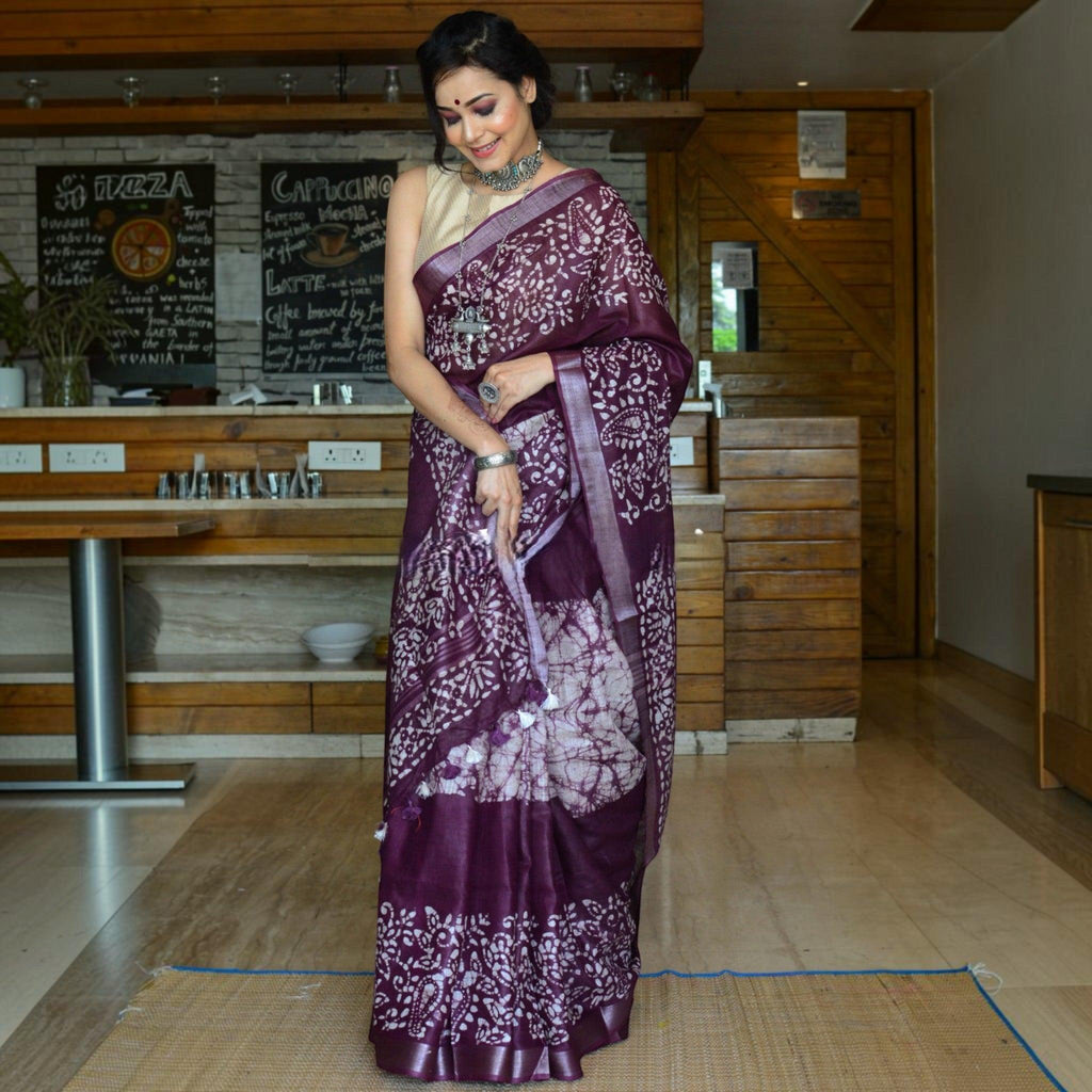 City Center premium cotton saree in deep purple with white batik print, styled with a beige blouse and silver jewelry