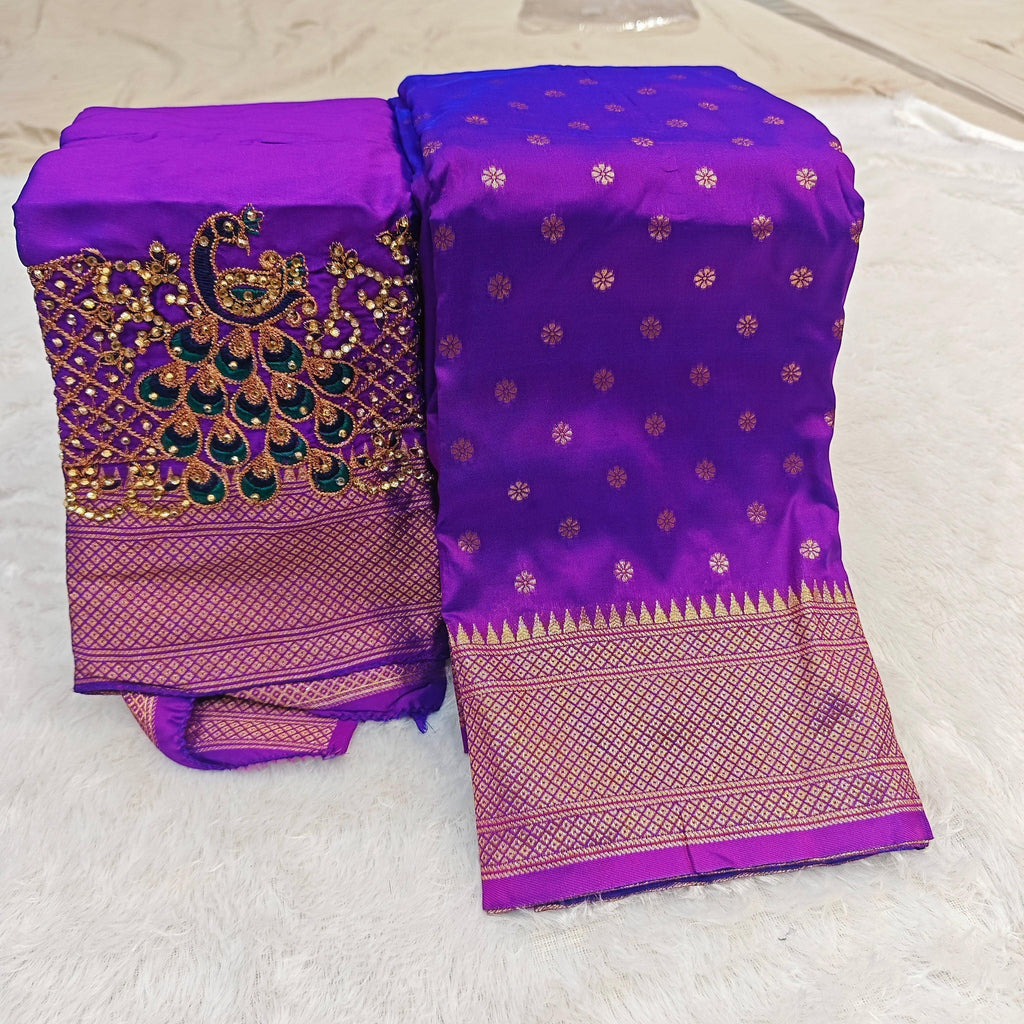 City Center premium purple Kalanjali silk saree with gold floral motifs and a peacock Aari work blouse piece