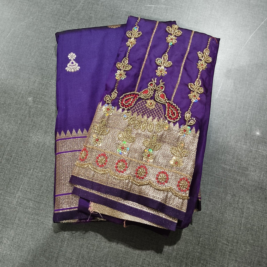 City Center purple Jhumka Paithani saree with intricate gold Aariwork embroidery on the blouse for festive occasions.