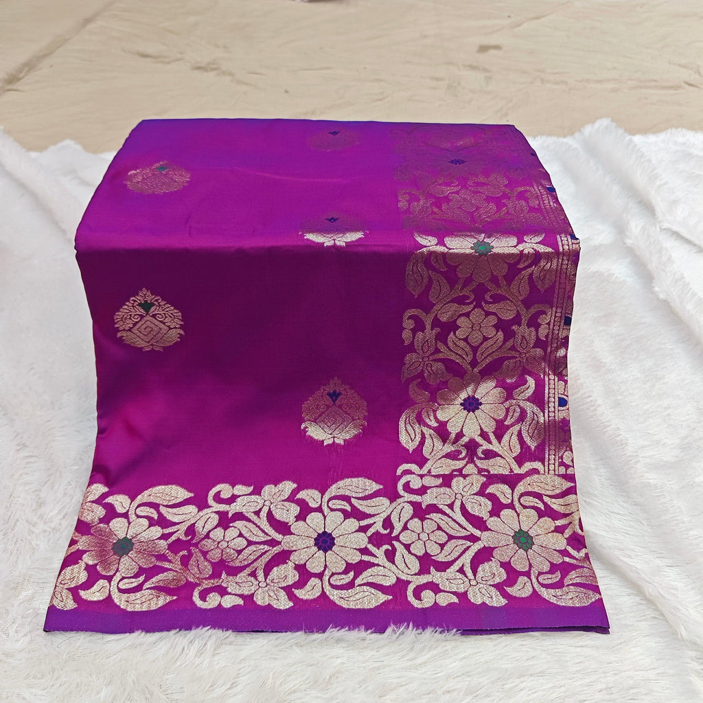 City Center Takshashila silk blend saree in vibrant purple with intricate gold zari and multi-color mina floral motifs.