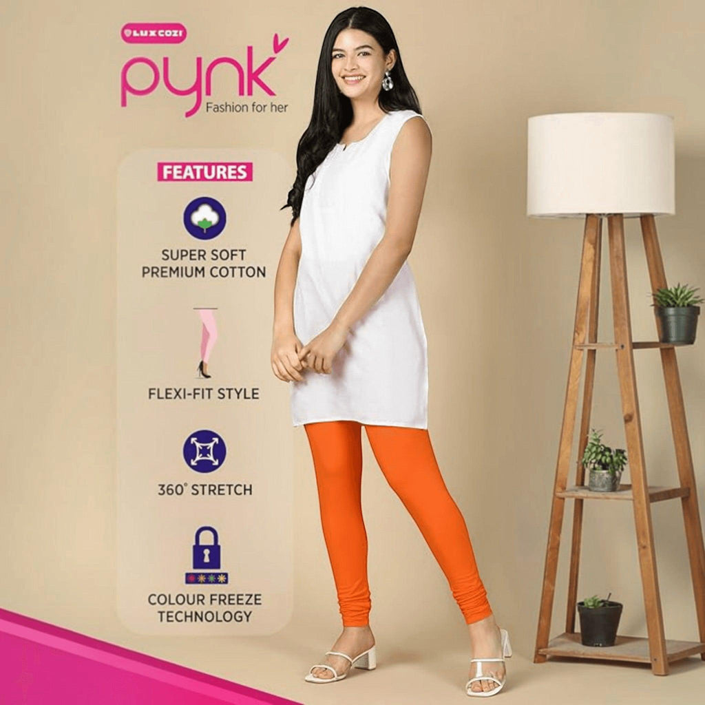 City Center PYNK by Lux Cozi orange cotton lycra churidar leggings worn by a woman with a white sleeveless tunic