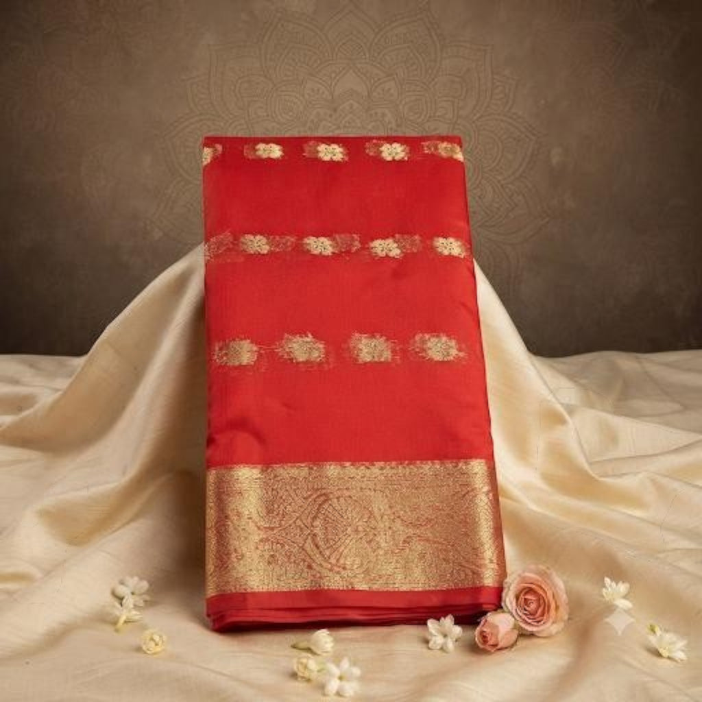 City Center red organza saree featuring intricate gold beet work embroidery and a wide traditional zari border