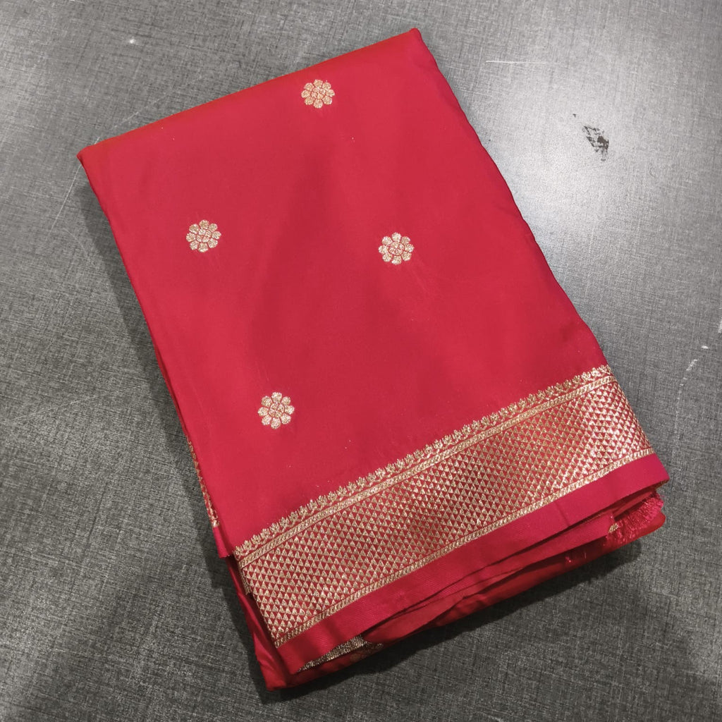 City Center Peshwai saree in vibrant red with gold floral motifs and a traditional woven zari border.