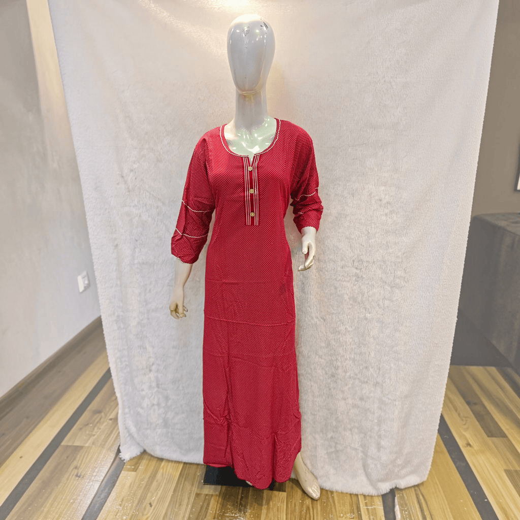 City Center red A-line gown in heavy rayon with white polka dots, three-quarter sleeves, and a button-down neckline.