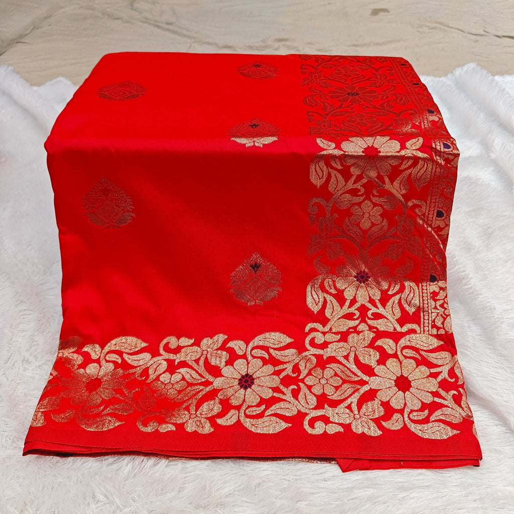 City Center red silk blend Takshashila saree featuring intricate gold zari and multi-color floral Mina weaving.