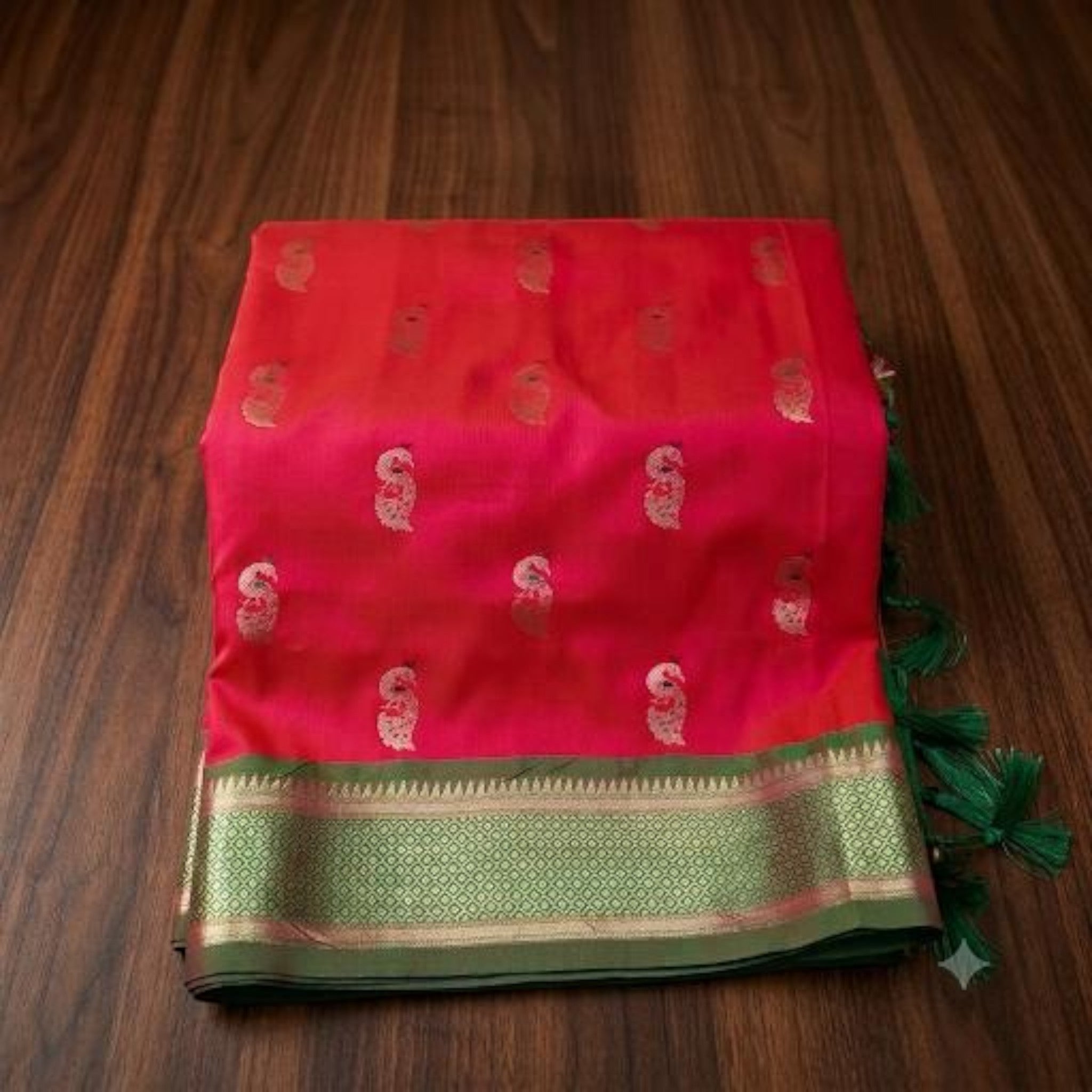 City Center handwoven red pure silk Paithani saree with green zari border and traditional peacock motifs