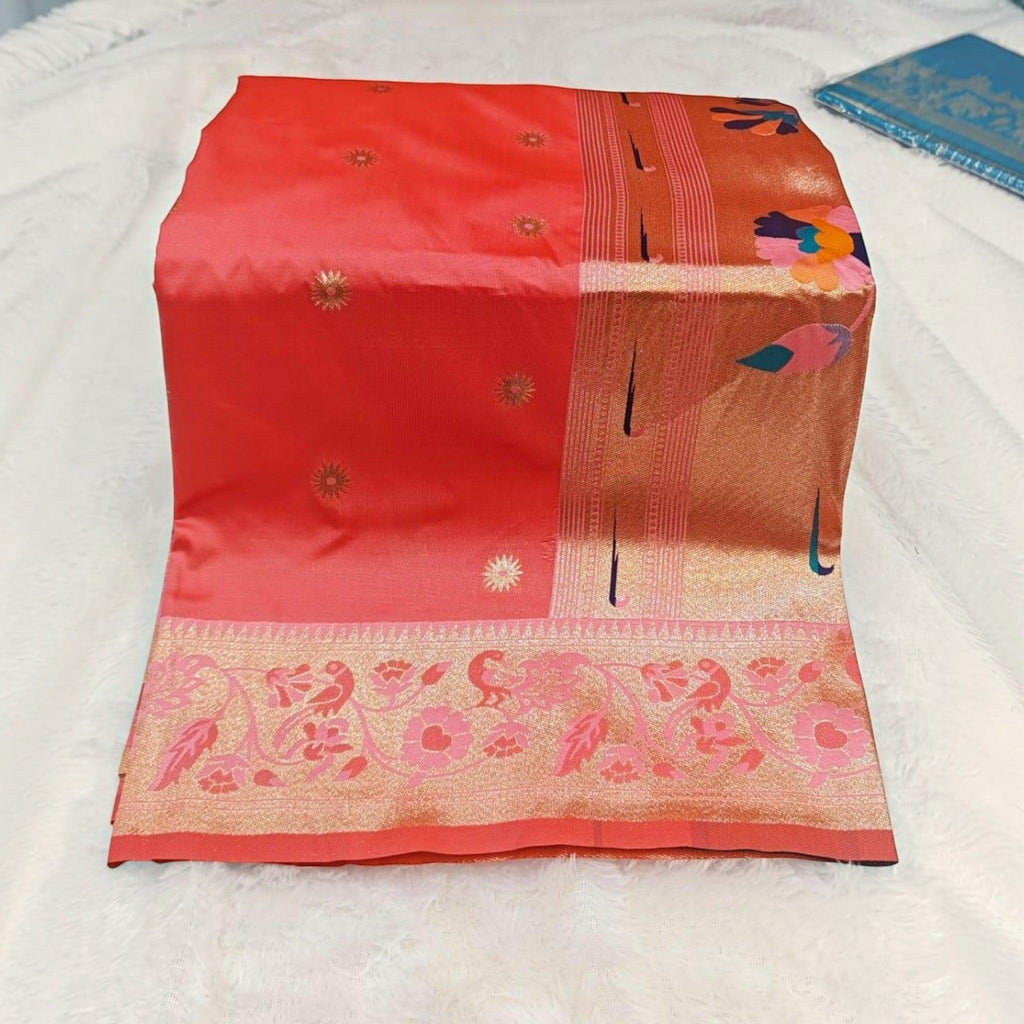 City Center traditional red silk saree featuring a wide gold border with intricate floral and peacock woven patterns.