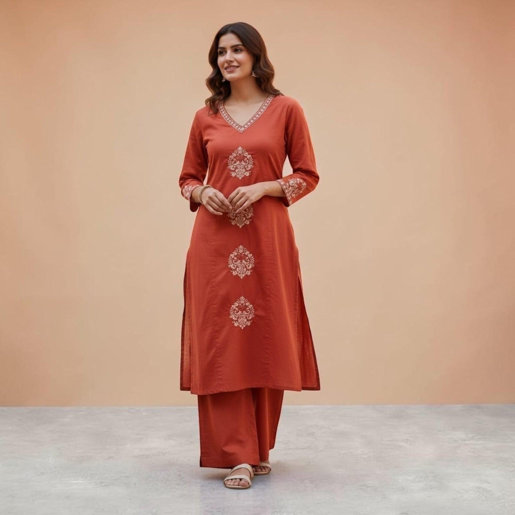 City Center rust orange pure cotton co-ord set with intricate white embroidery on the V-neckline and front panels.
