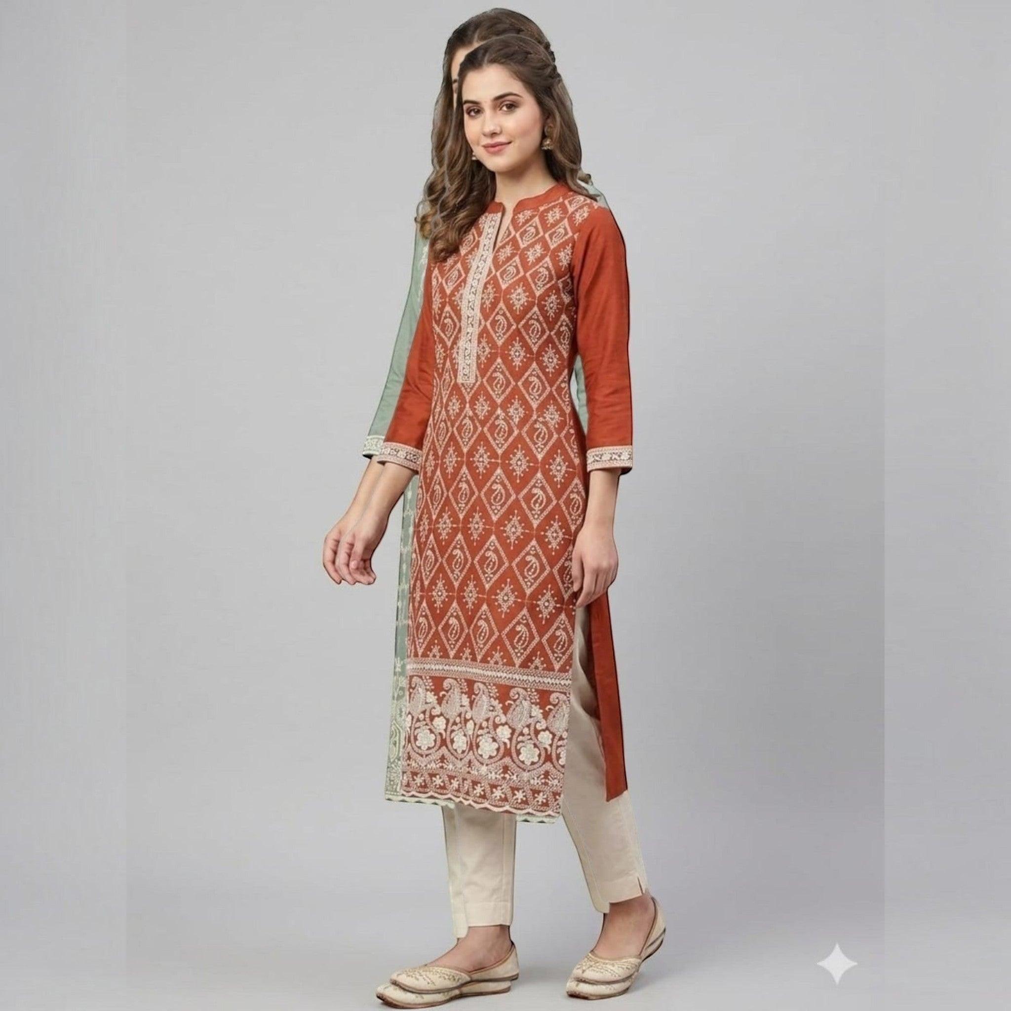 City Center rust orange straight kurta tunic with white geometric embroidery, mandarin collar, and three-quarter sleeves