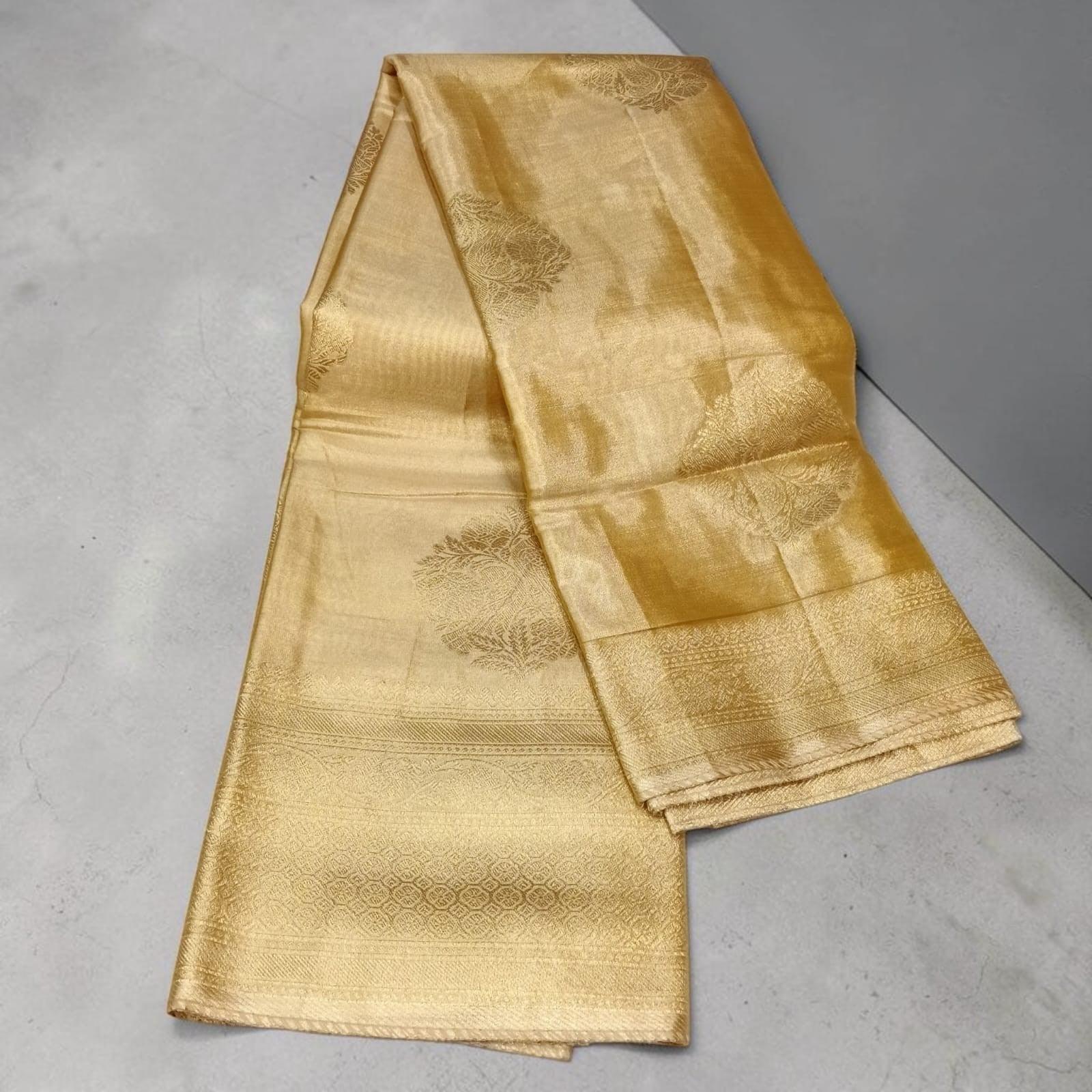 City Center Sankalp gold tissue saree with intricate woven floral motifs and a wide decorative border