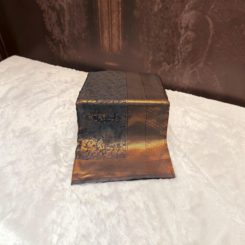 City Center satin silk saree in deep black and metallic bronze with intricate floral patterns and a glossy finish