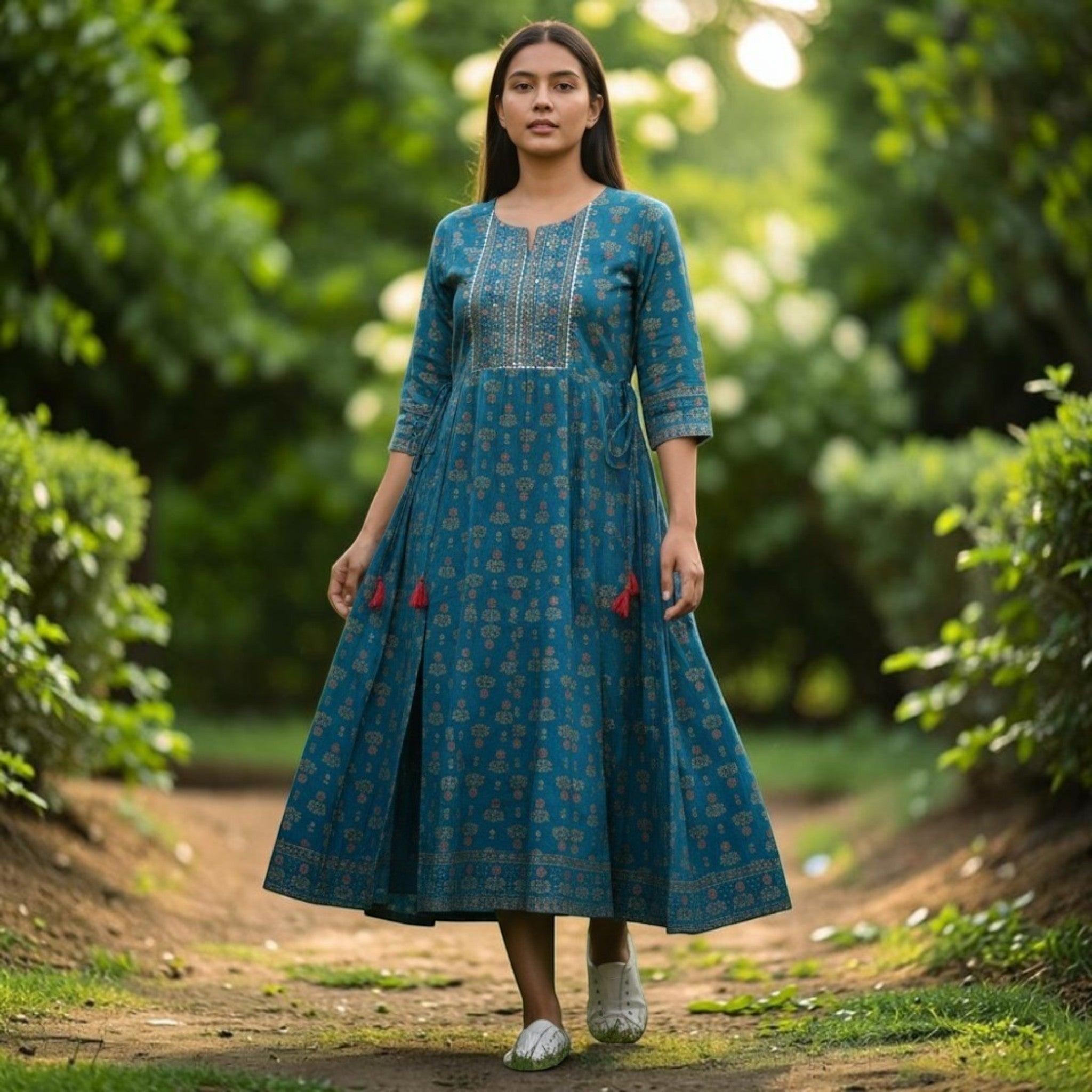 City Center Simra Anarkali Kurti in teal with gold ethnic print, featuring a flared silhouette and tassel details.