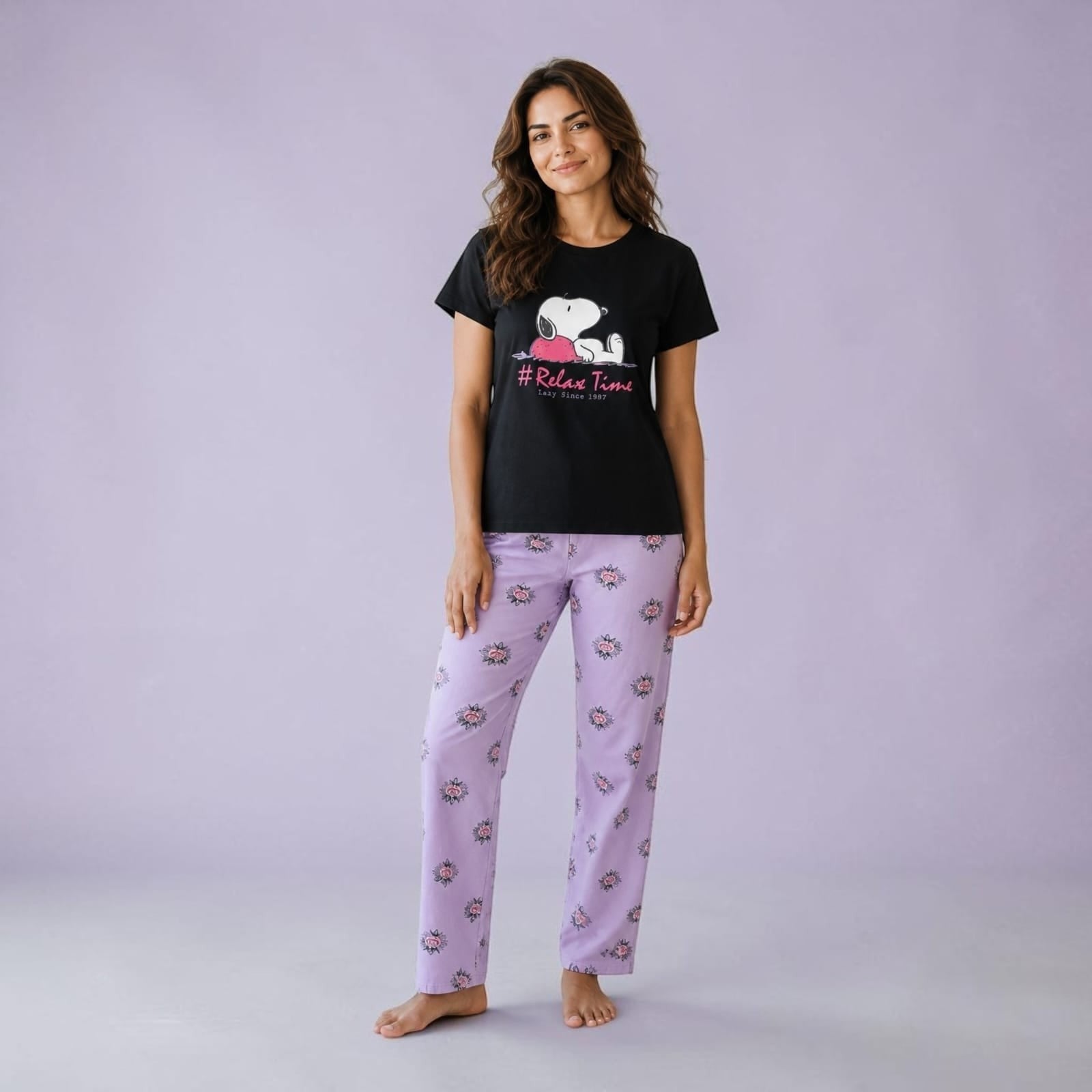 City Center co-ord set featuring a black Snoopy Relax Time t-shirt and light purple floral print lounge pants