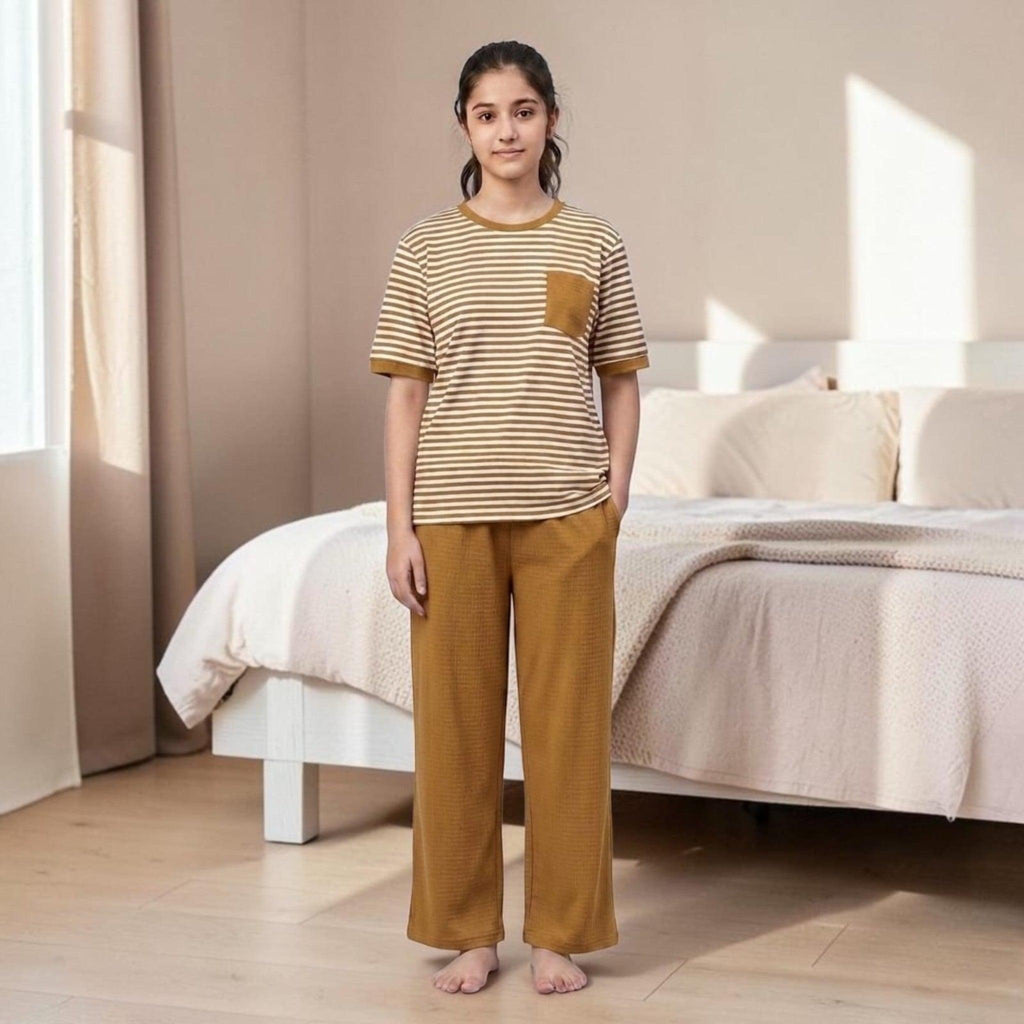 City Center women's airport co-ord set featuring a brown and white striped t-shirt and matching textured trousers.