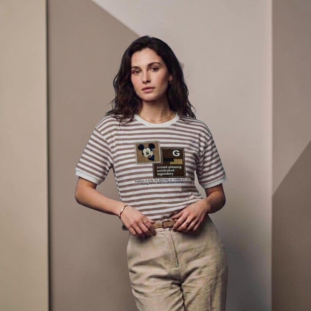 City Center premium cotton t-shirt with brown and white stripes and a graphic print worn by a woman