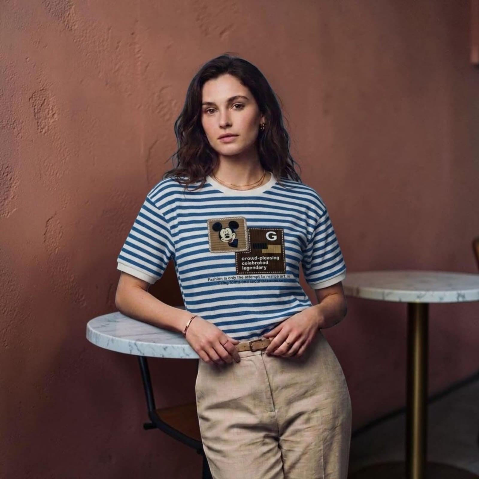 City Center premium cotton t-shirt with blue and white stripes, Mickey Mouse graphic, and text print on a model.