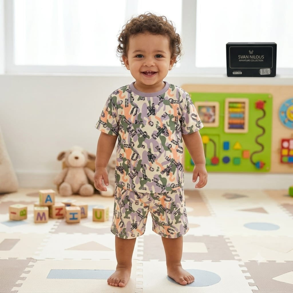 City Center Svan Hildur premium co-ord set for boys featuring a vibrant multi-colored camouflage print on soft fabric.