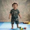 City Center Svan Hildur premium dark green boys co-ord set with white graphic print on soft cotton fabric