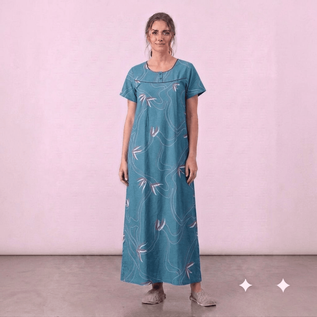 City Center teal cotton feeding gown with white floral line art, short sleeves, and elegant neck embroidery.