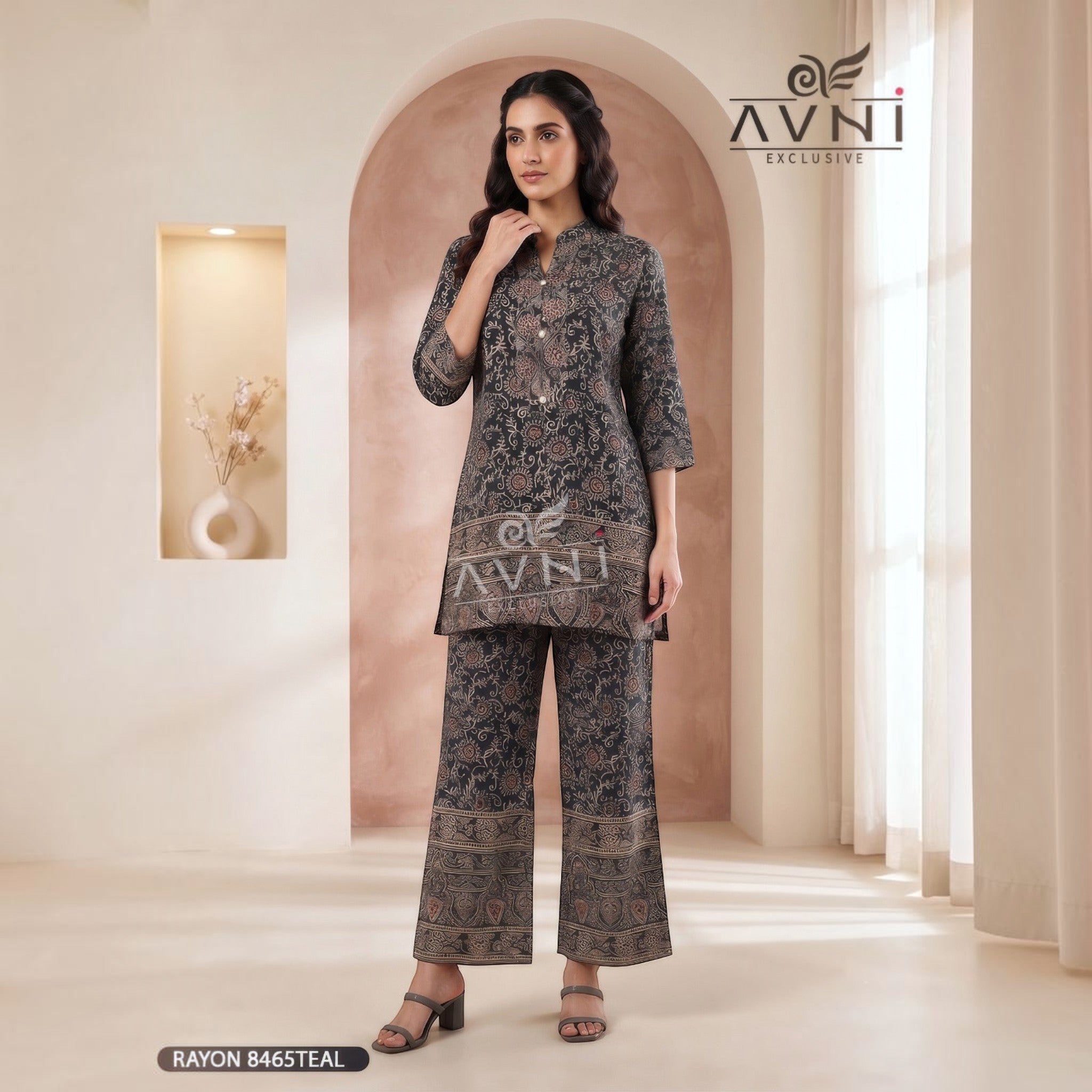 City Center ethnic co-ord set in dark teal rayon with intricate floral print, featuring a kurta and wide-leg trousers.