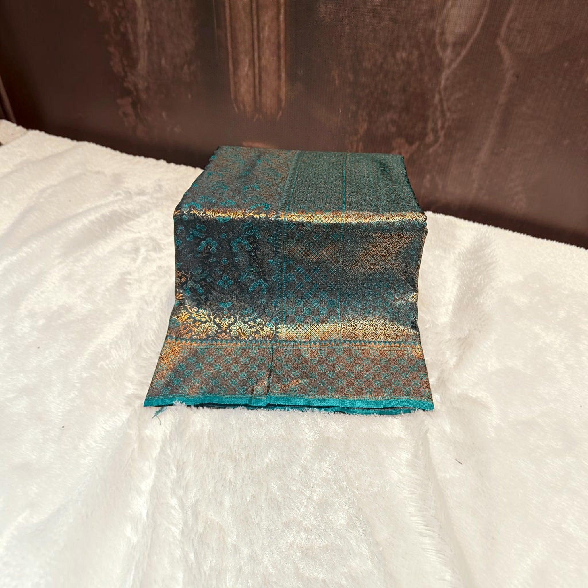 City Center teal satin silk saree with intricate gold zari woven floral and geometric patterns on a soft glossy fabric