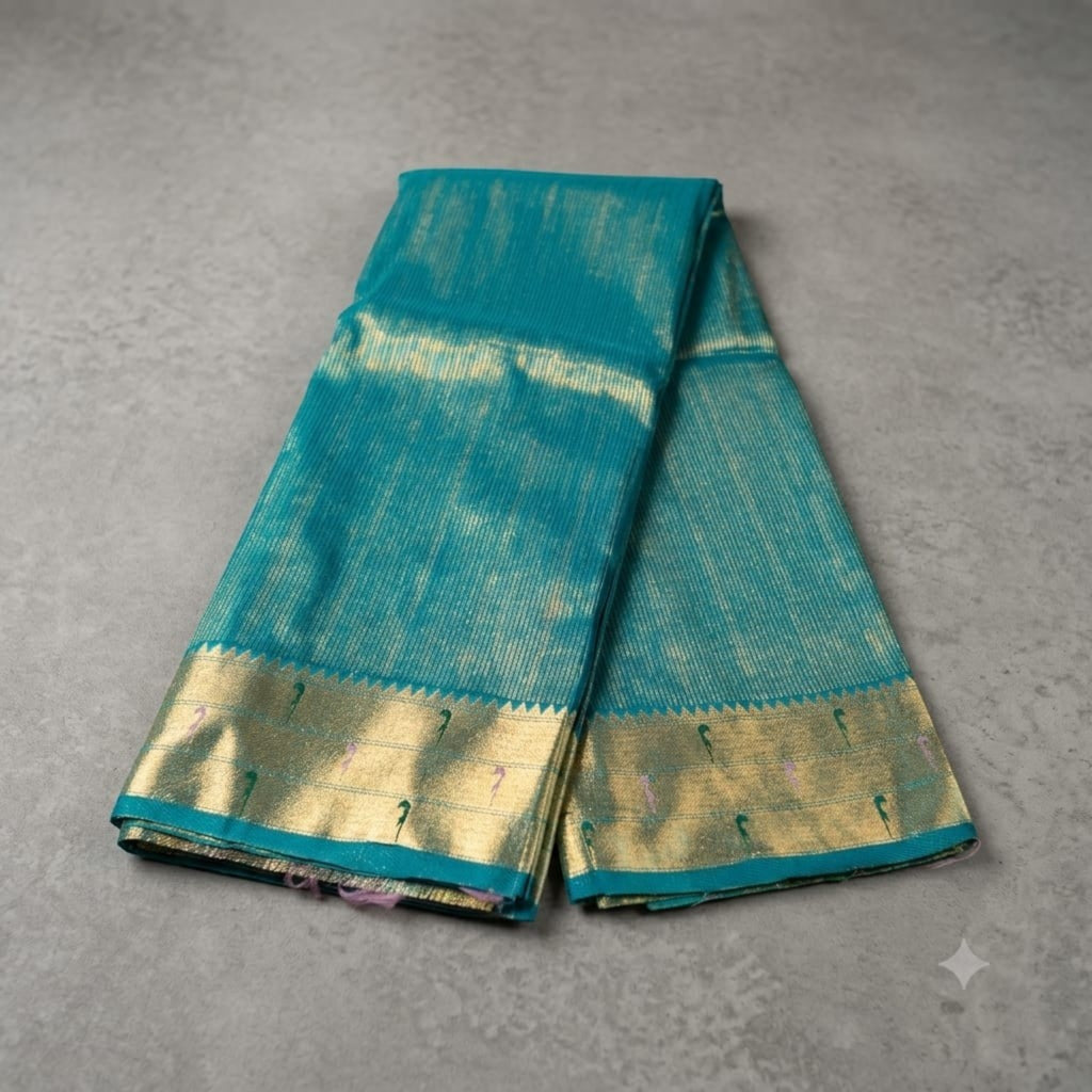 City Center teal silk Muniya Paithani saree with intricate gold zari border and traditional parrot motifs