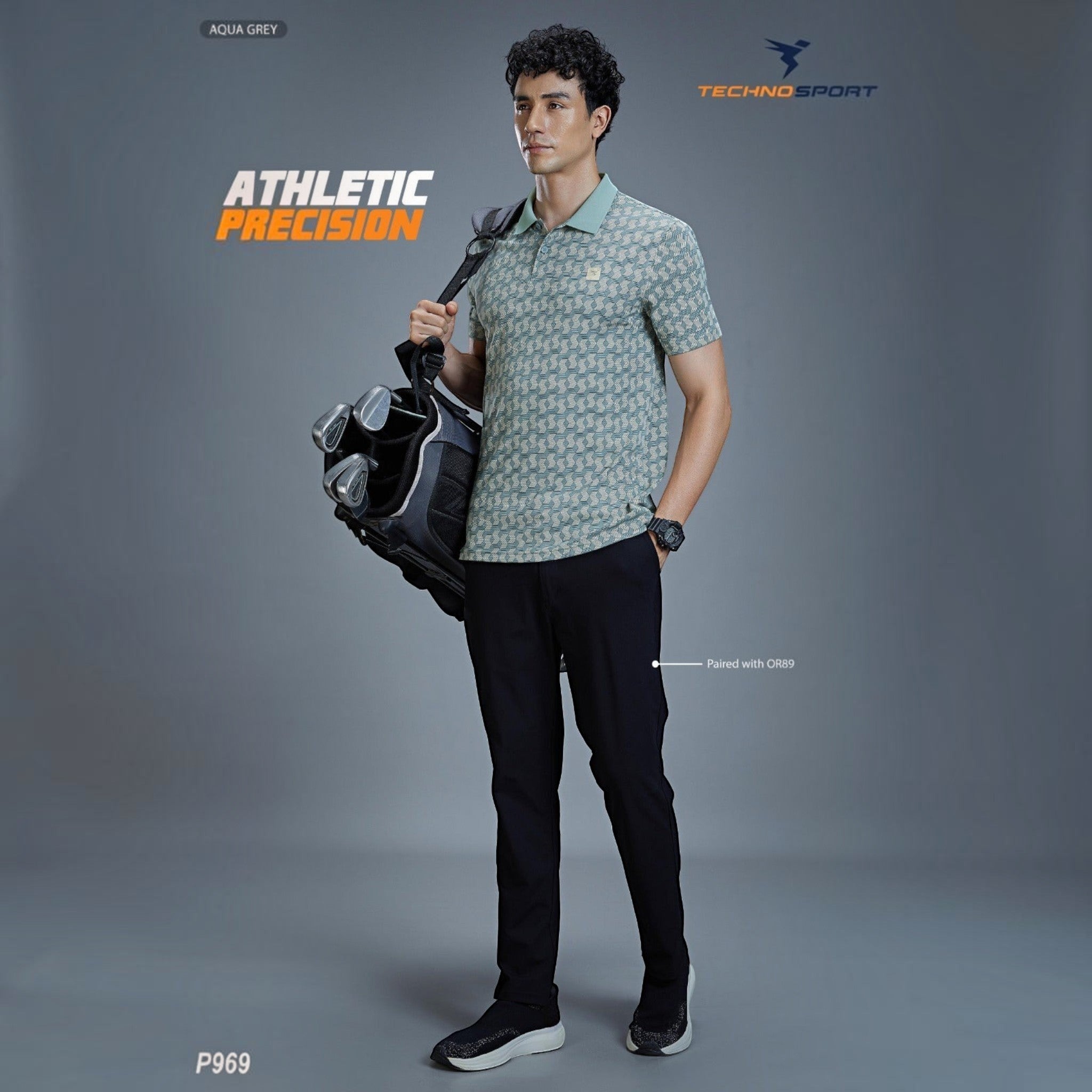City Center Technosport P969 aqua grey patterned polo shirt worn by a male golfer carrying a golf bag