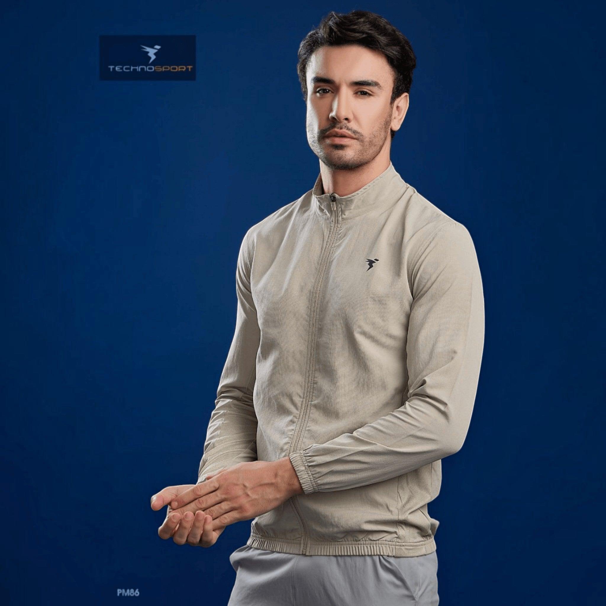 City Center Technosport beige lightweight slim-fit hi-neck jacket with moisture-wicking fabric on a male model