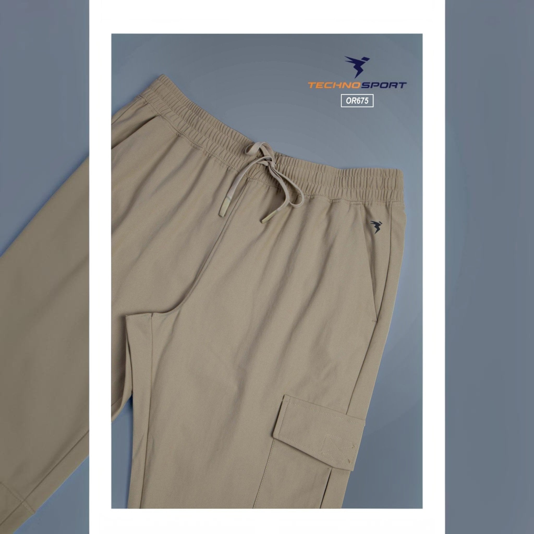 City Center Technosport OR675 beige athletic track pants with an elastic drawstring waistband and cargo pocket.
