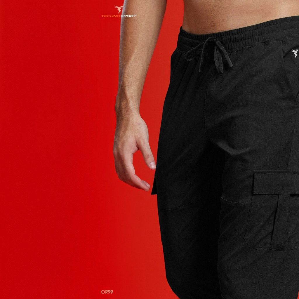 City Center Technosport TS Flexi black woven cargo pants with drawstring waist and side pockets on a red background