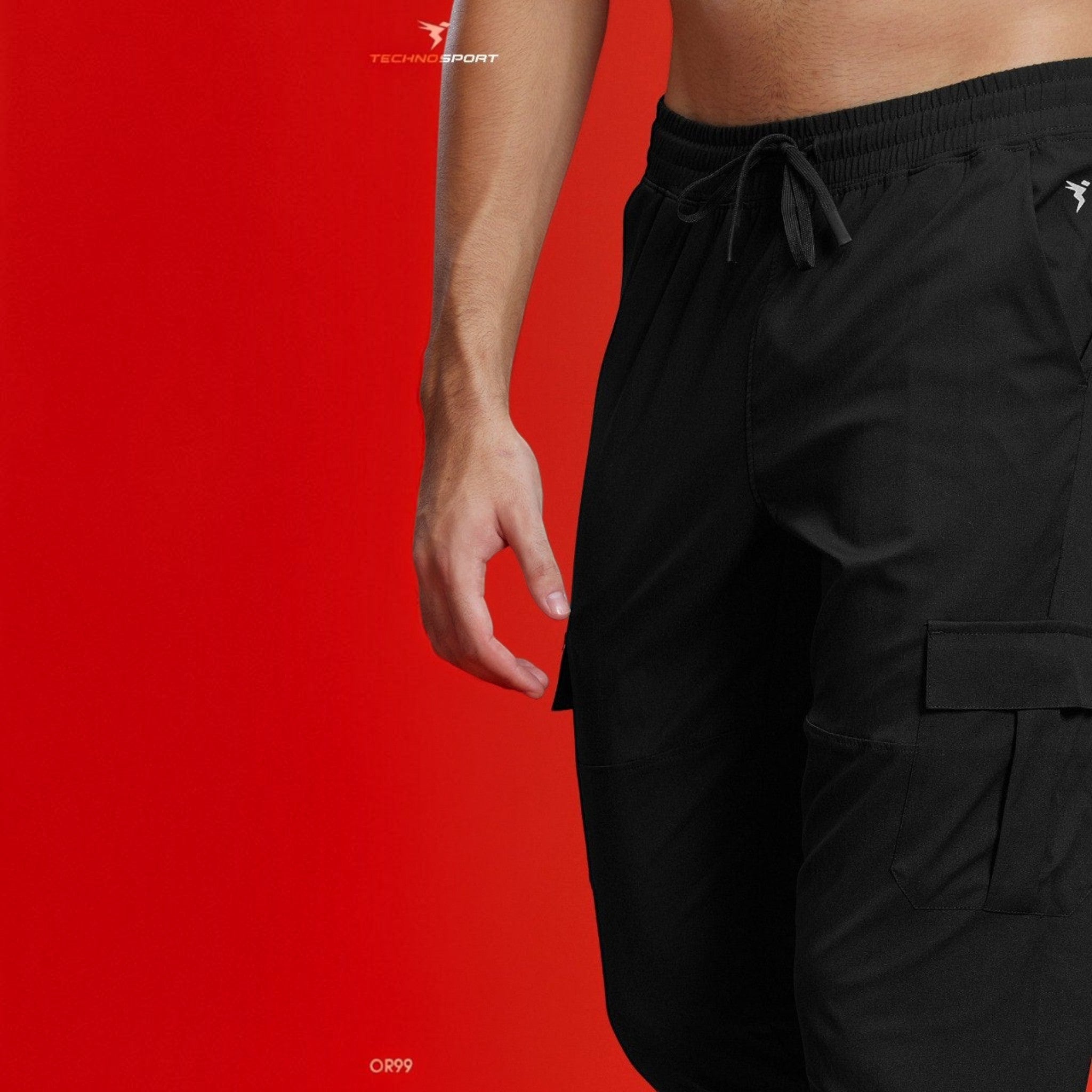 City Center Technosport TS Flexi black woven cargo pants with drawstring waist and side pockets on a red background