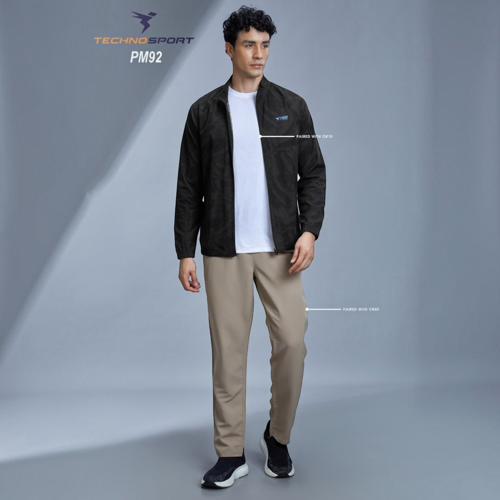 City Center Technosport full-sleeve black hi-neck jacket with subtle all-over print worn by a male model