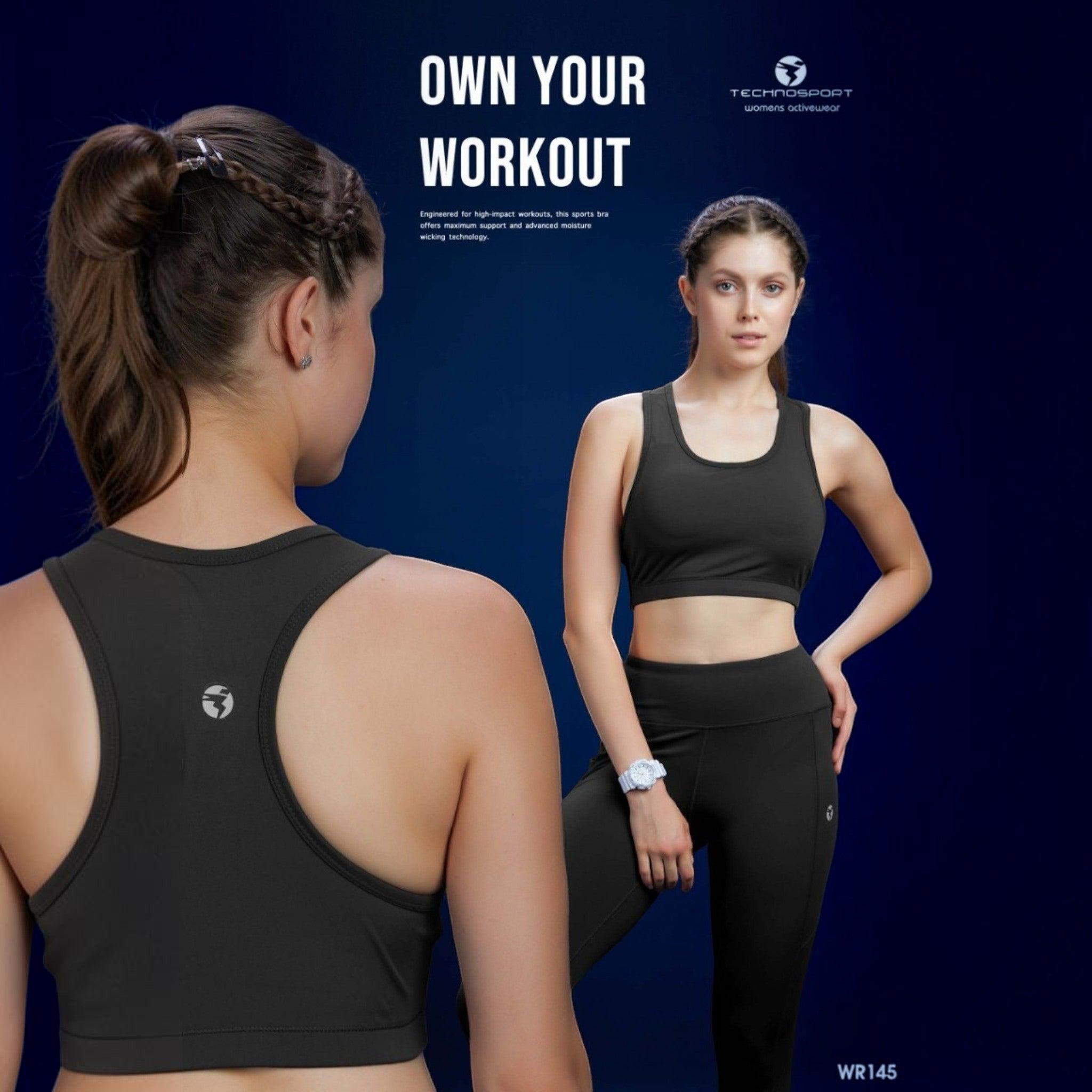 City Center Technosport Elastoplus black racer back sports bra worn by a model against a blue background