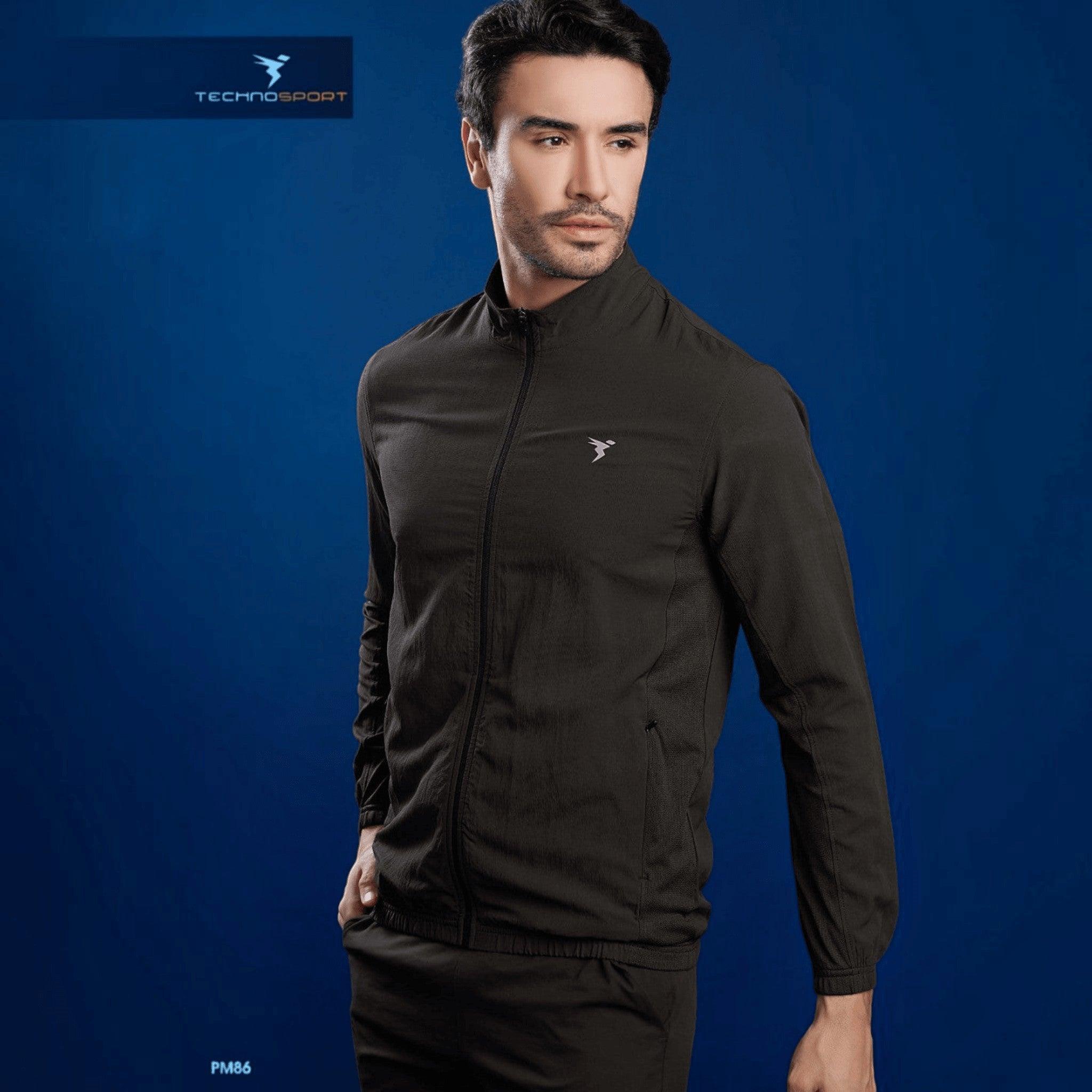City Center Technosport men's black slim-fit hi-neck jacket in lightweight moisture-wicking fabric on a model