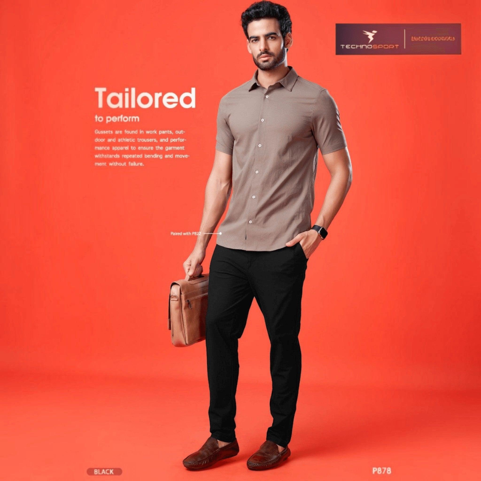 City Center Technosport black 4-way stretch casual trousers with Duracool technology on a model against a red background