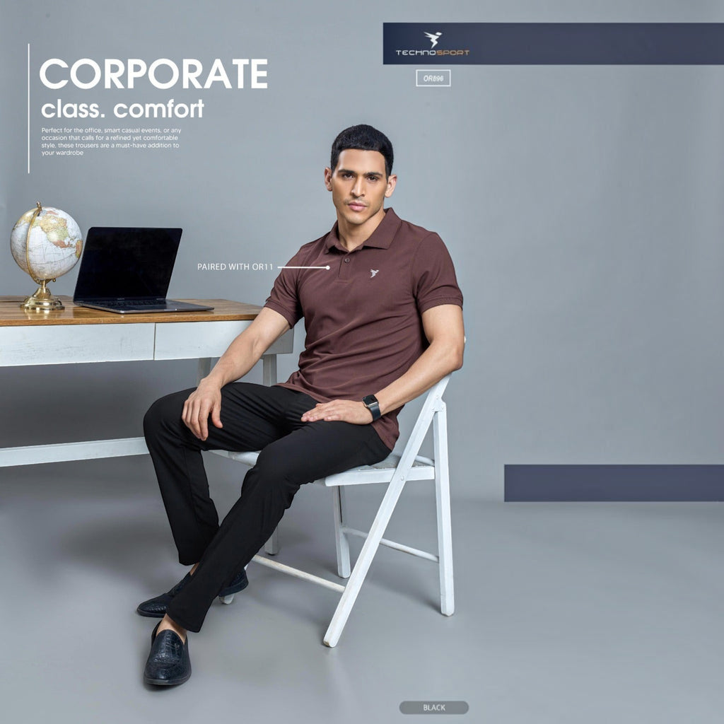 City Center model wearing Technosport DuraCool+ black stretch casual trousers in a modern office setting
